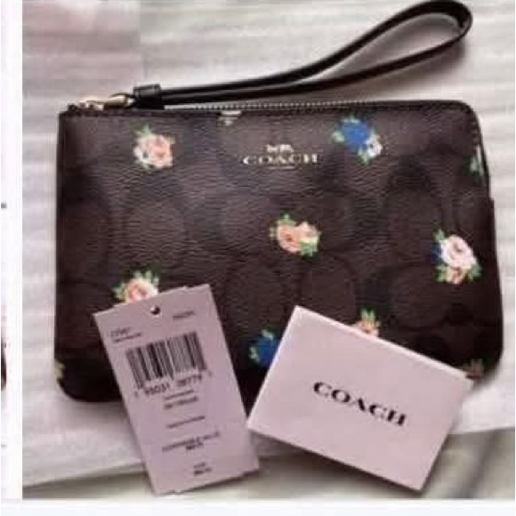 Coach Handbags - Coach Brown Floral Wristlet Clutch with Pink and Blue Accents